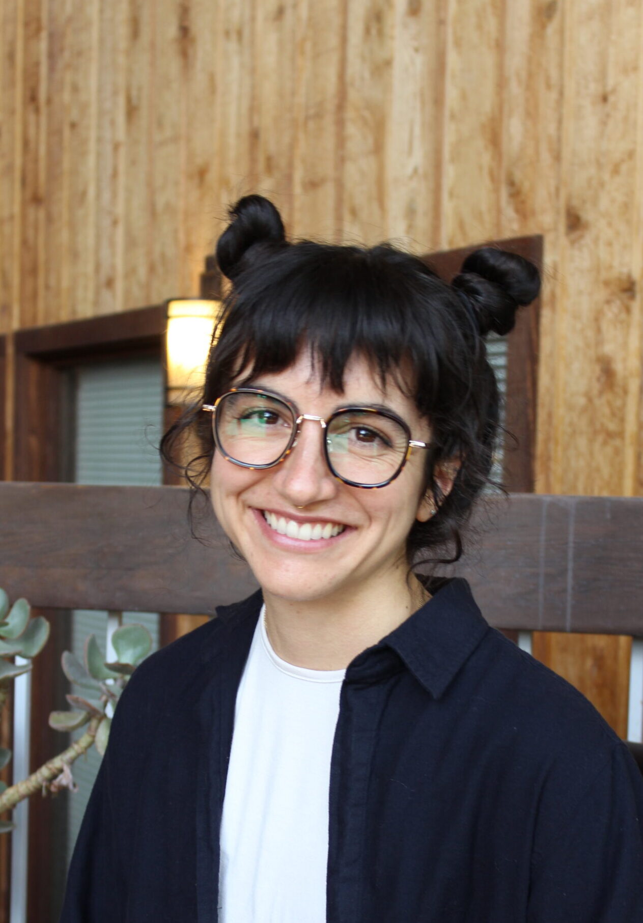 Janelle Ochs MA, LPCC, a A somatic and systems therapist with Root & Rise Collective
